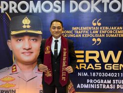 Kabag Binkar Ro SDM Polda Sumsel AKBP Erwin Aras Genda  Raih Gelar Doktor